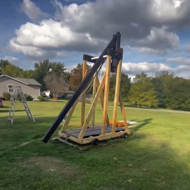 The 25 foot trebuchet on the workshop property, loaded with a pumpkin